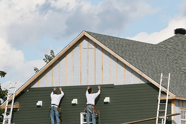 Professional Vinyl Siding technician working in Immaculata, PA